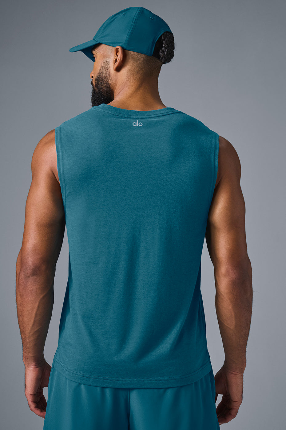 Side view of ladies muscle tank, highlighting dropped armholes.