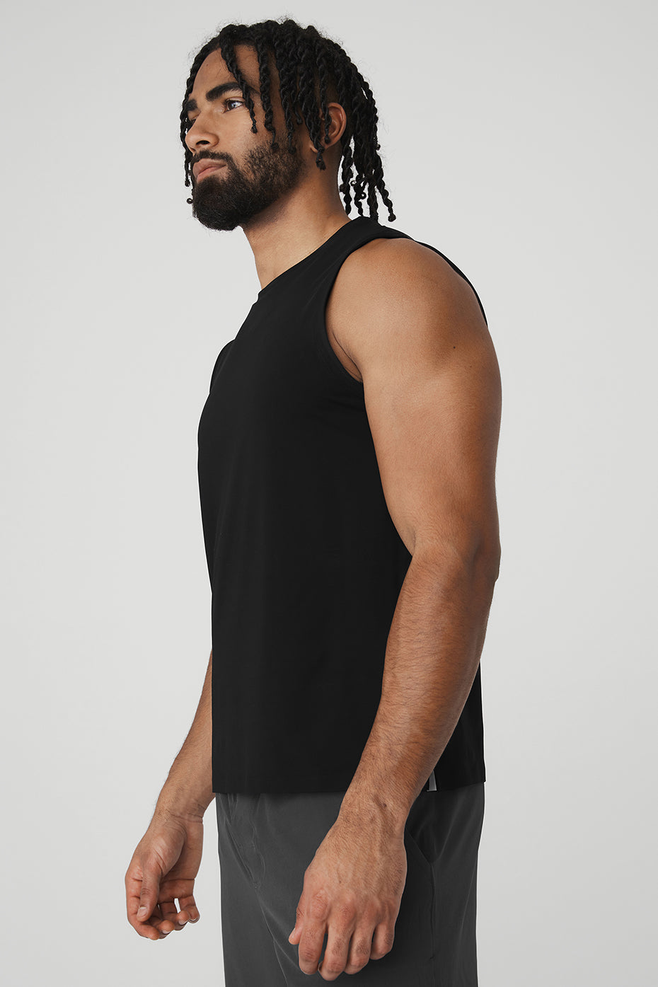 Front view of the black Idol Performance Tank highlighting its sleek design and fit