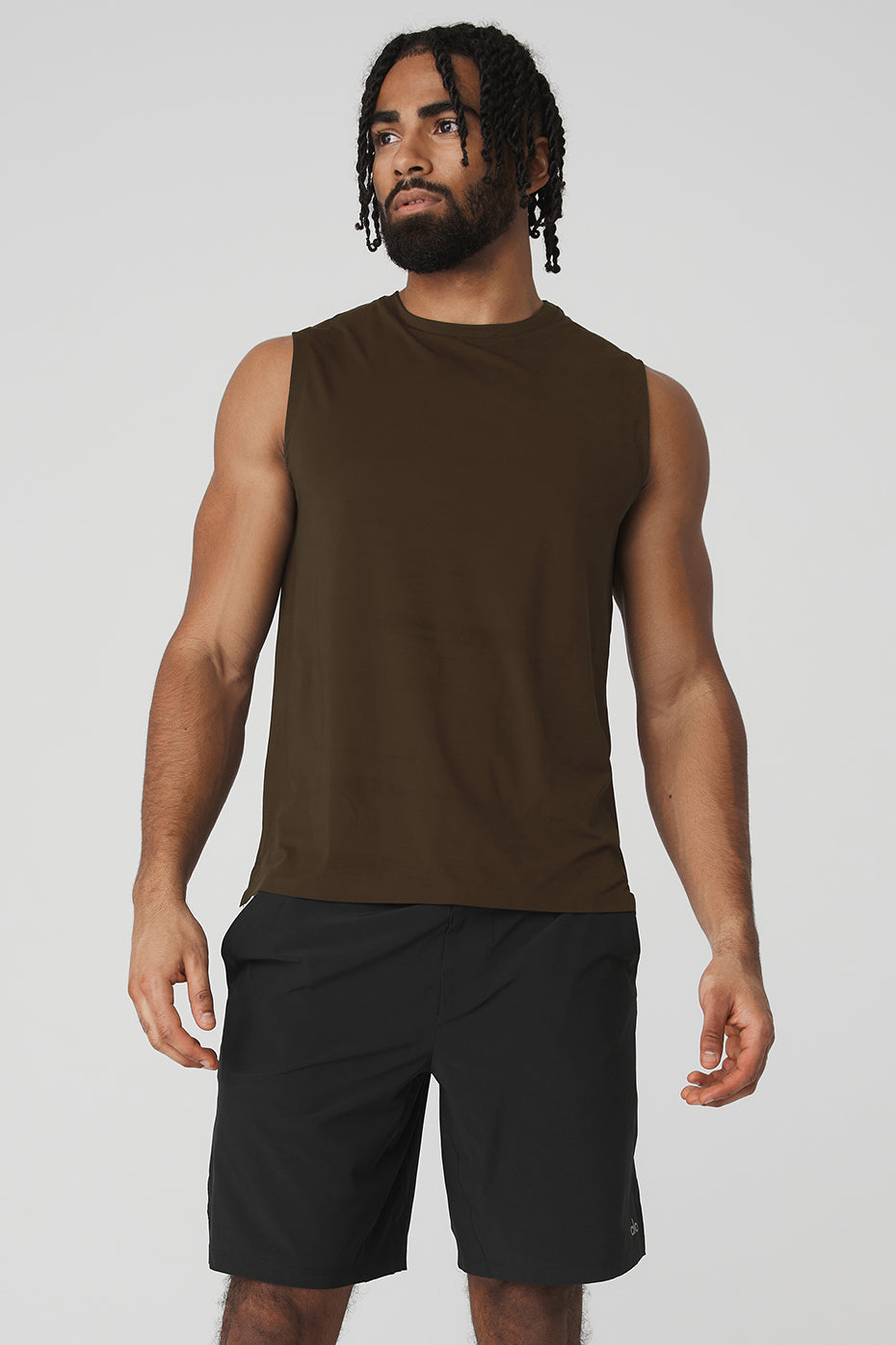 Front view of Idol Performance Tank in Espresso, showcasing its lightweight design.