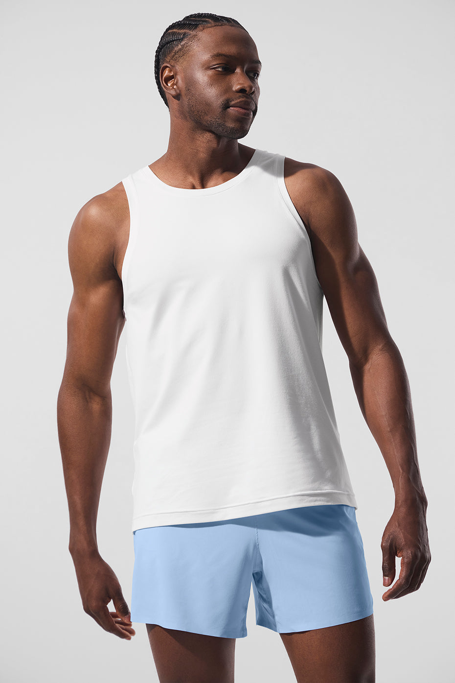 Front view of the Conquer Performance Tank in white, ideal for gym sessions.