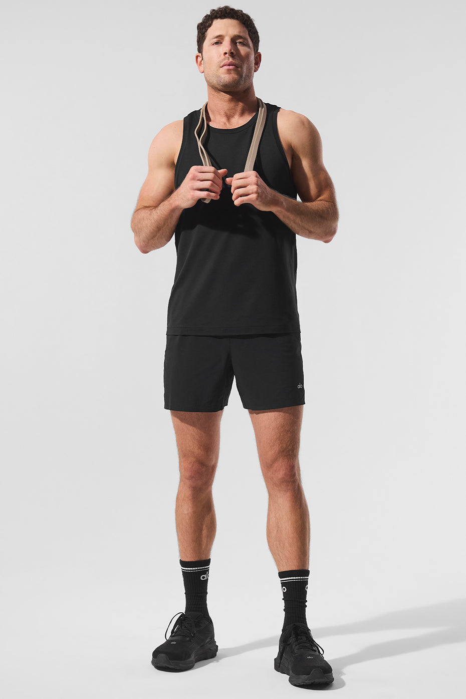 Close-up of the performance jersey fabric of the Conquer Tank for men and women