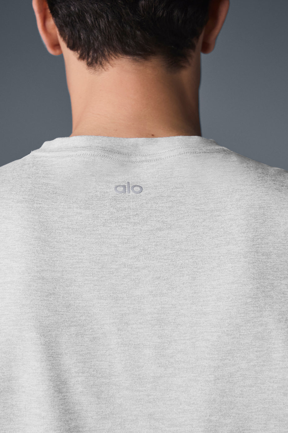 Close-up of womens muscle tank fabric texture and stitching