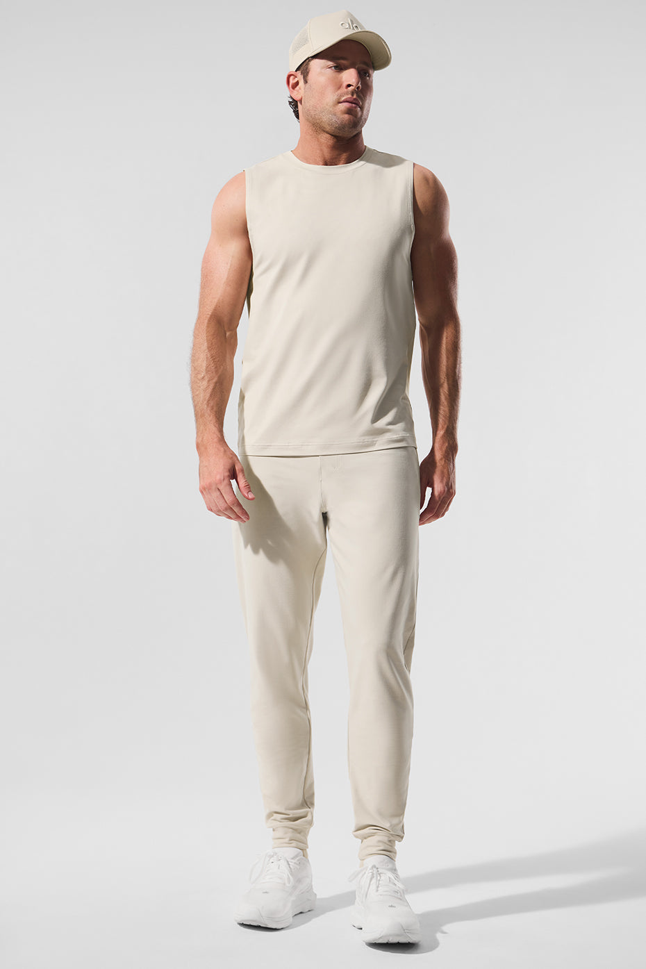 Side view of ladies muscle tank showcasing wide armholes for comfort.