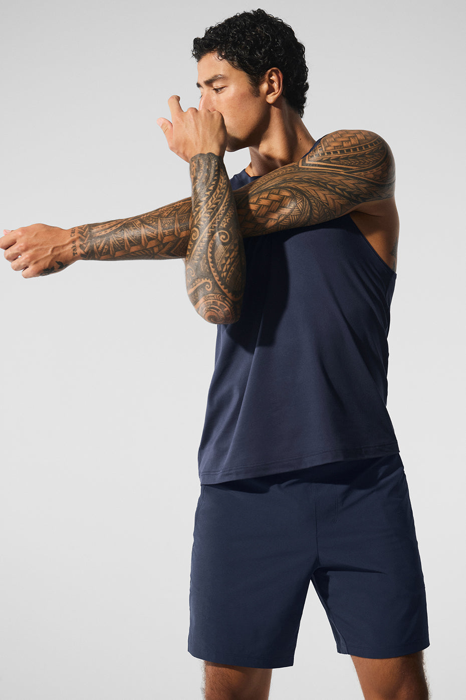 Front view of navy blue muscle tank top for women