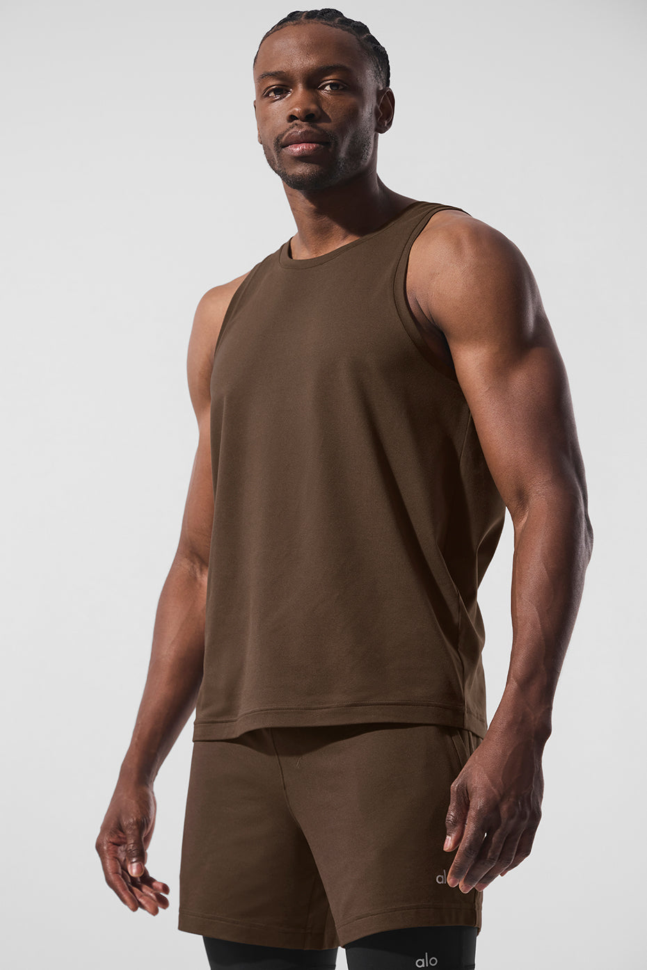 Front view of Conquer performance tank showcasing relaxed fit.