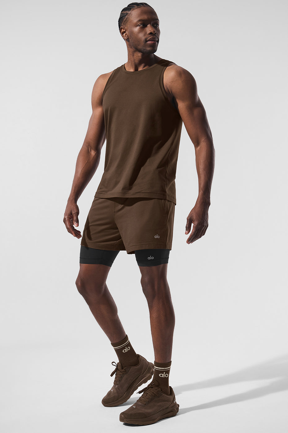 Front view of Conquer performance tank showcasing relaxed fit.