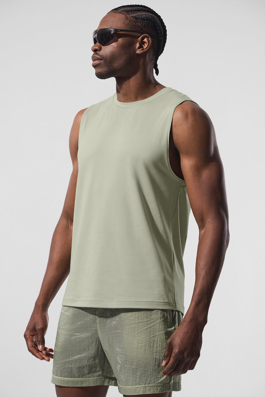 Back view of the ladies muscle tank, demonstrating its relaxed fit during workouts.