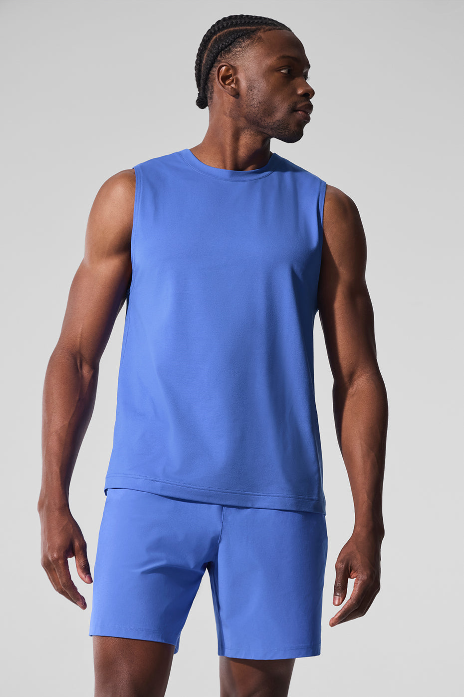 Front view of the Conquer muscle tank in Marathon Blue, perfect for gym workouts