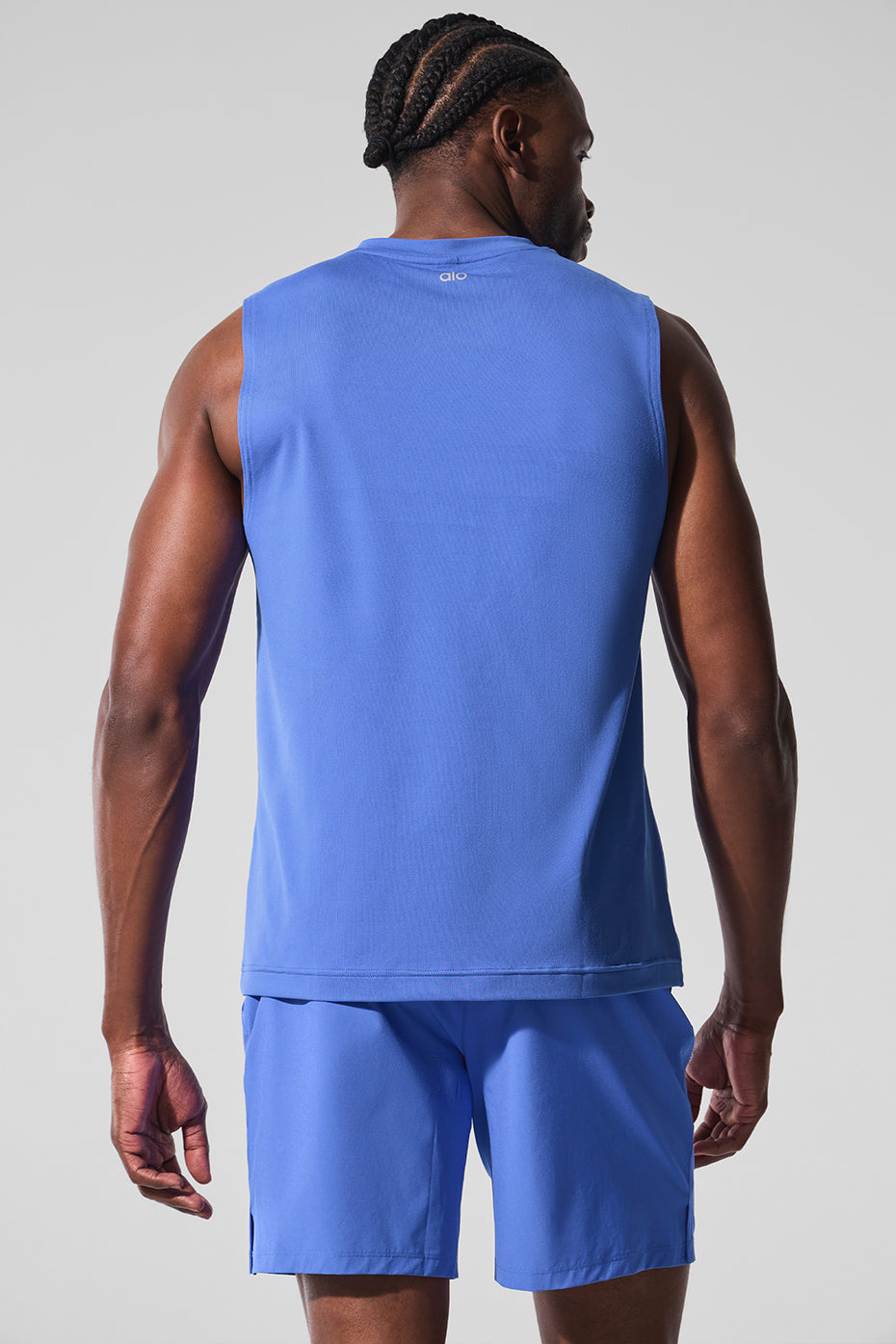 Close-up of the breathable fabric and wide armholes of the womens fitness tank