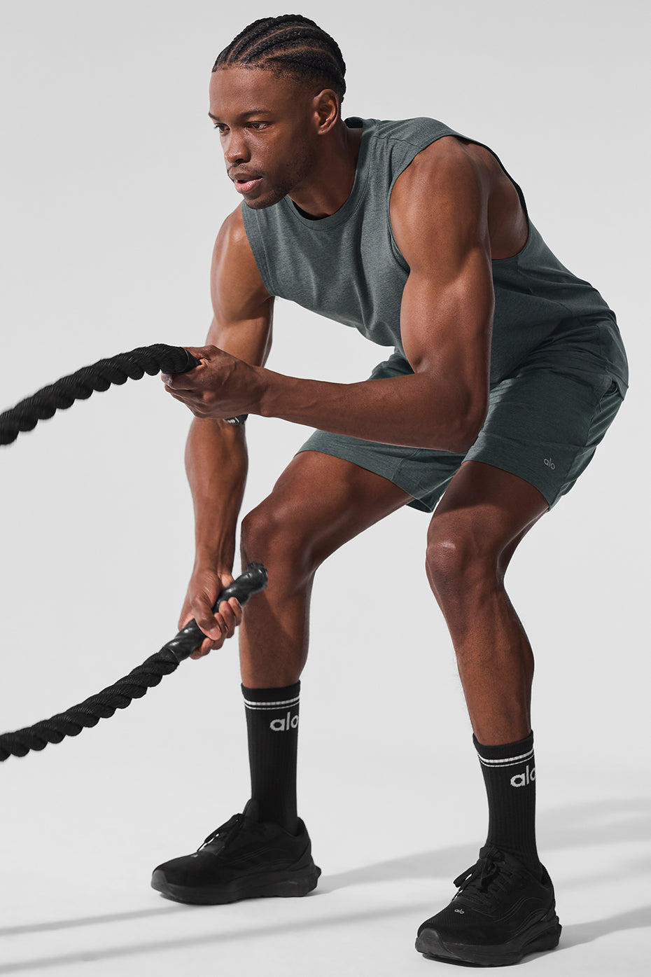 Side view showcasing the wide armholes of the muscle tank.