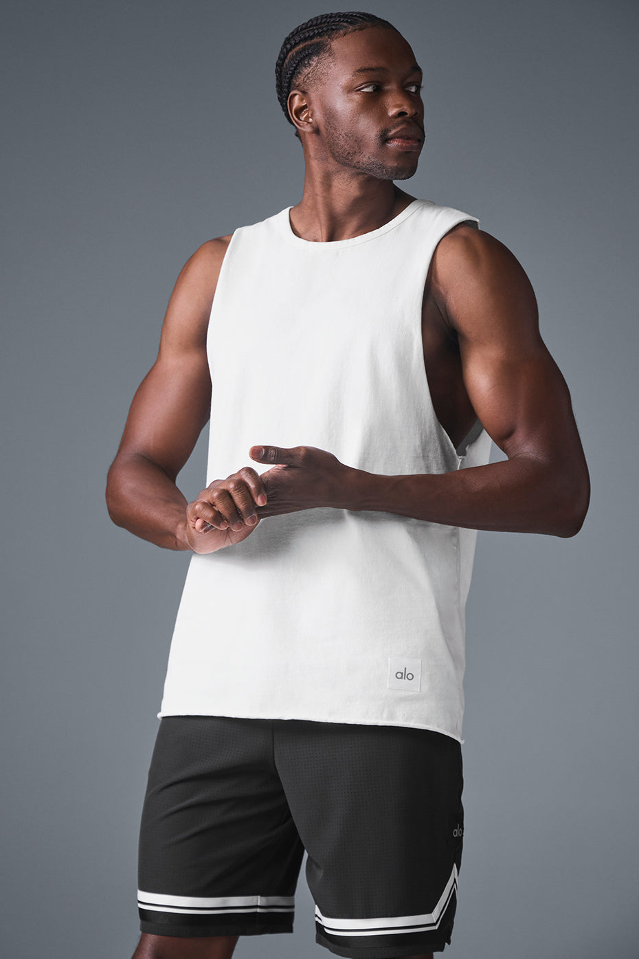 Front view of white men's sleeveless shirt with raw-edge details