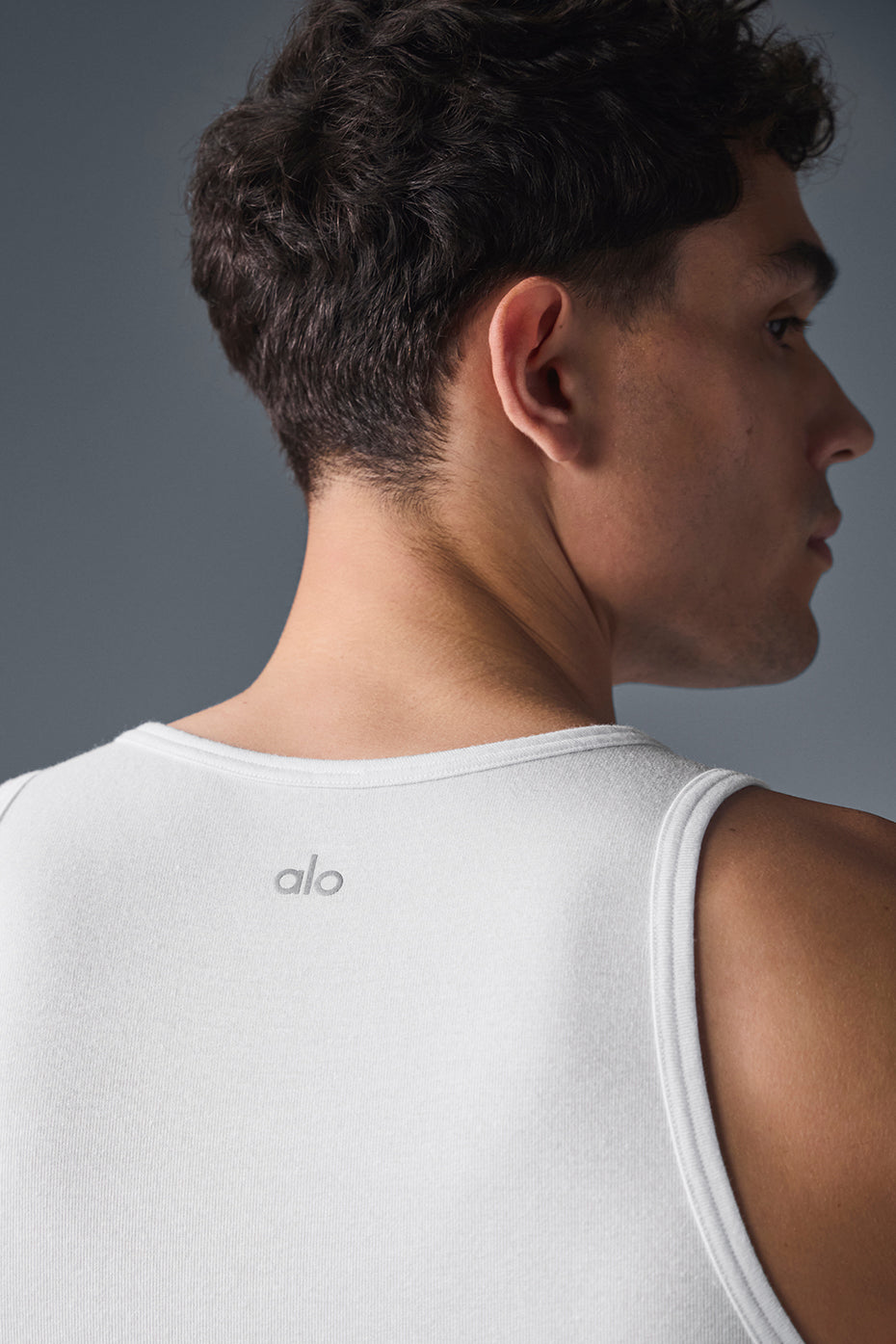 Front view of the white tank top womens, ideal for athletic training.