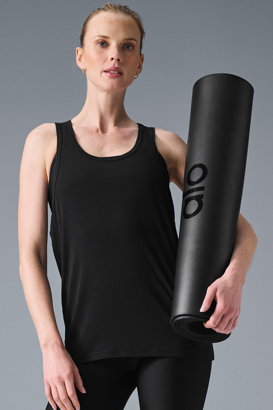 Model wearing the everyday modal rib tank during a workout session outdoors