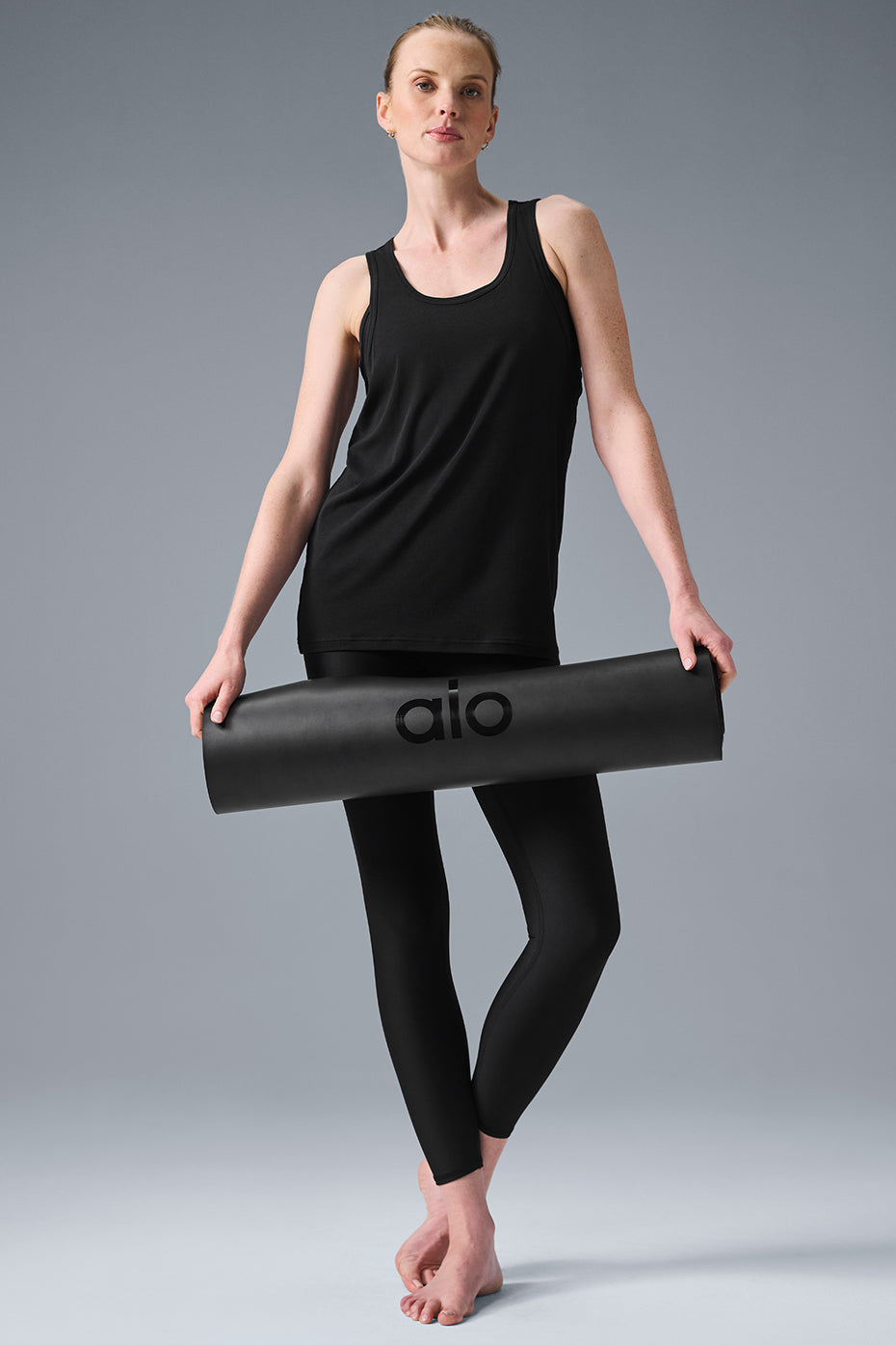 Black modal rib tank top with racerback straps, ideal for fitness and daily use