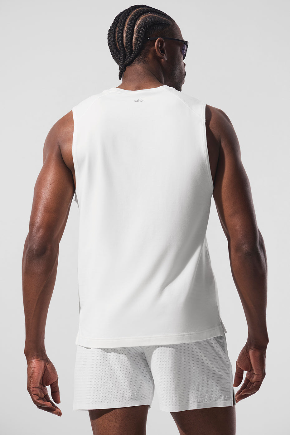 Flat lay of muscle tank paired with yoga pants, ready for a fitness class