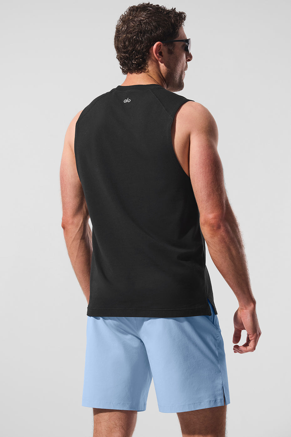 Model wearing the workout tank during outdoor running