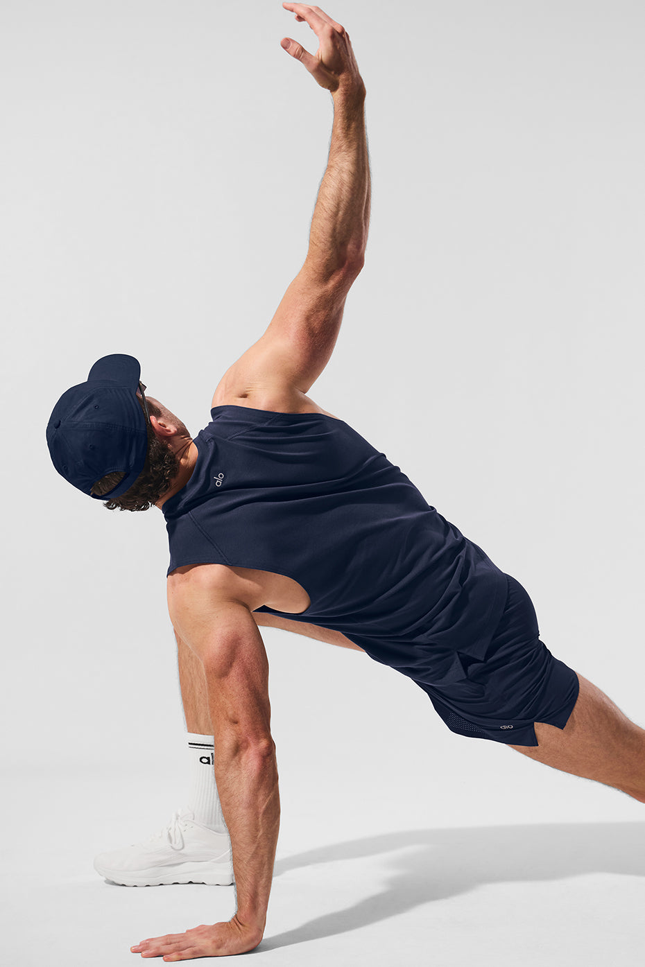 Front angle of ALO muscle tank showing navy color and sleek fit