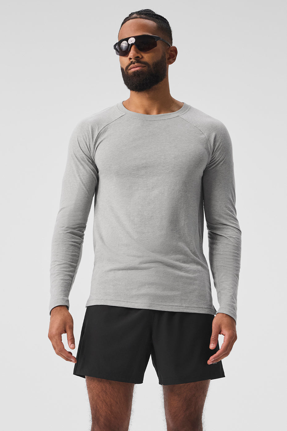 Front view of the Triumph long sleeve graphic tee in heather grey, showcasing its relaxed fit.