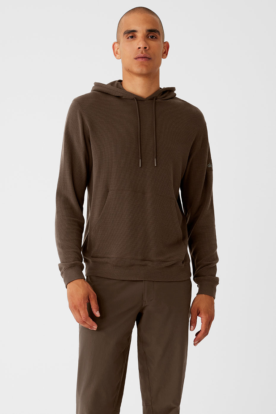 Espresso Comfort Hoodie front view, highlighting the drawstring hood and kangaroo pocket.