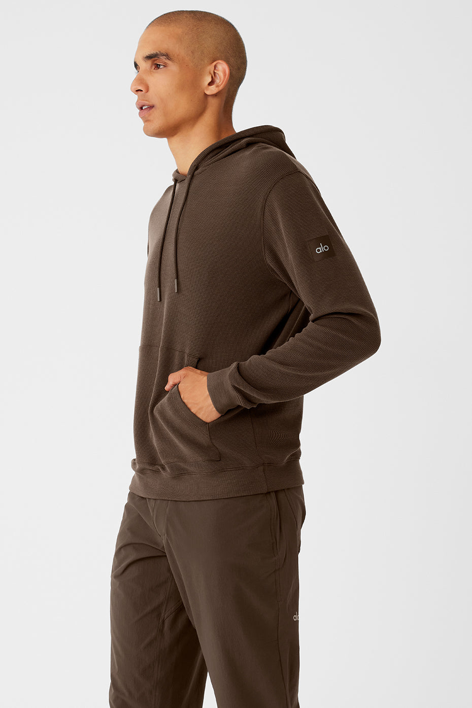 Close-up of the fabric texture of the Espresso Comfort Hoodie, emphasizing its thermal qualities.