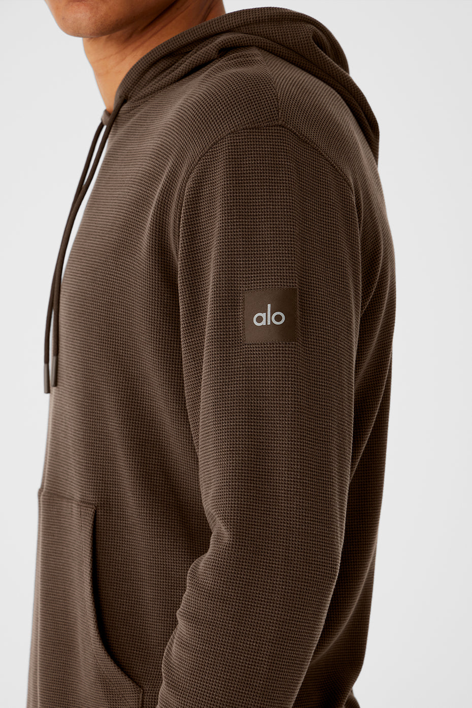 Espresso Comfort Hoodie front view, highlighting the drawstring hood and kangaroo pocket.
