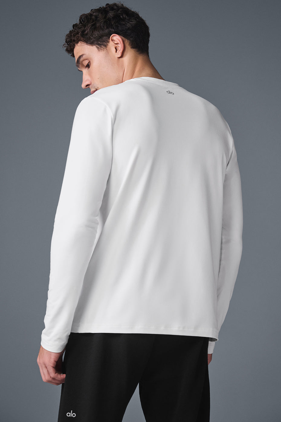 Close-up of the fabric texture of the crewneck, emphasizing comfort and quality
