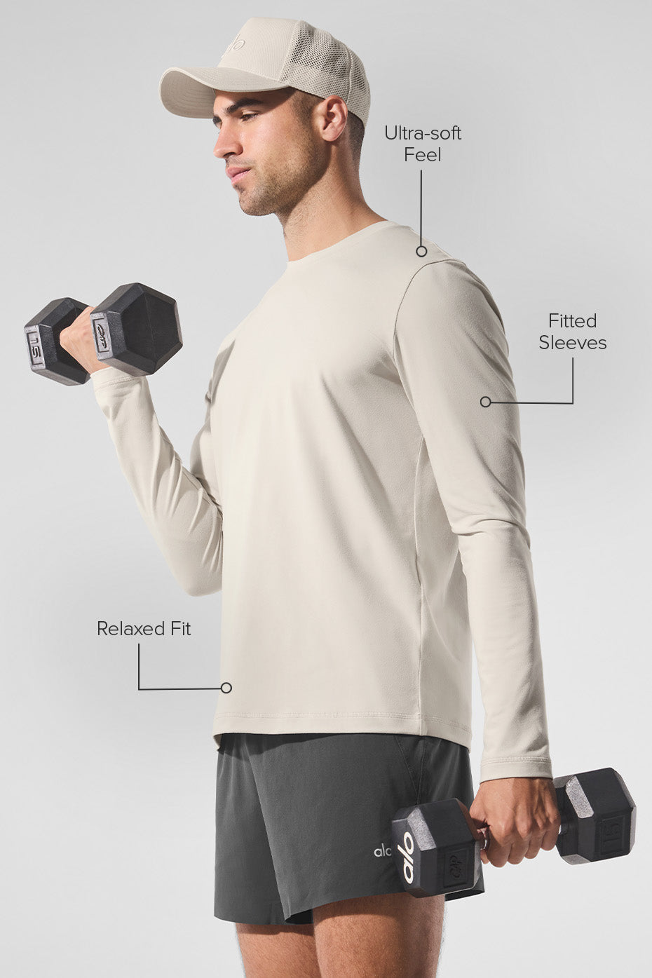 Model wearing the lightweight crewneck sweatshirt layered under a jacket outdoors