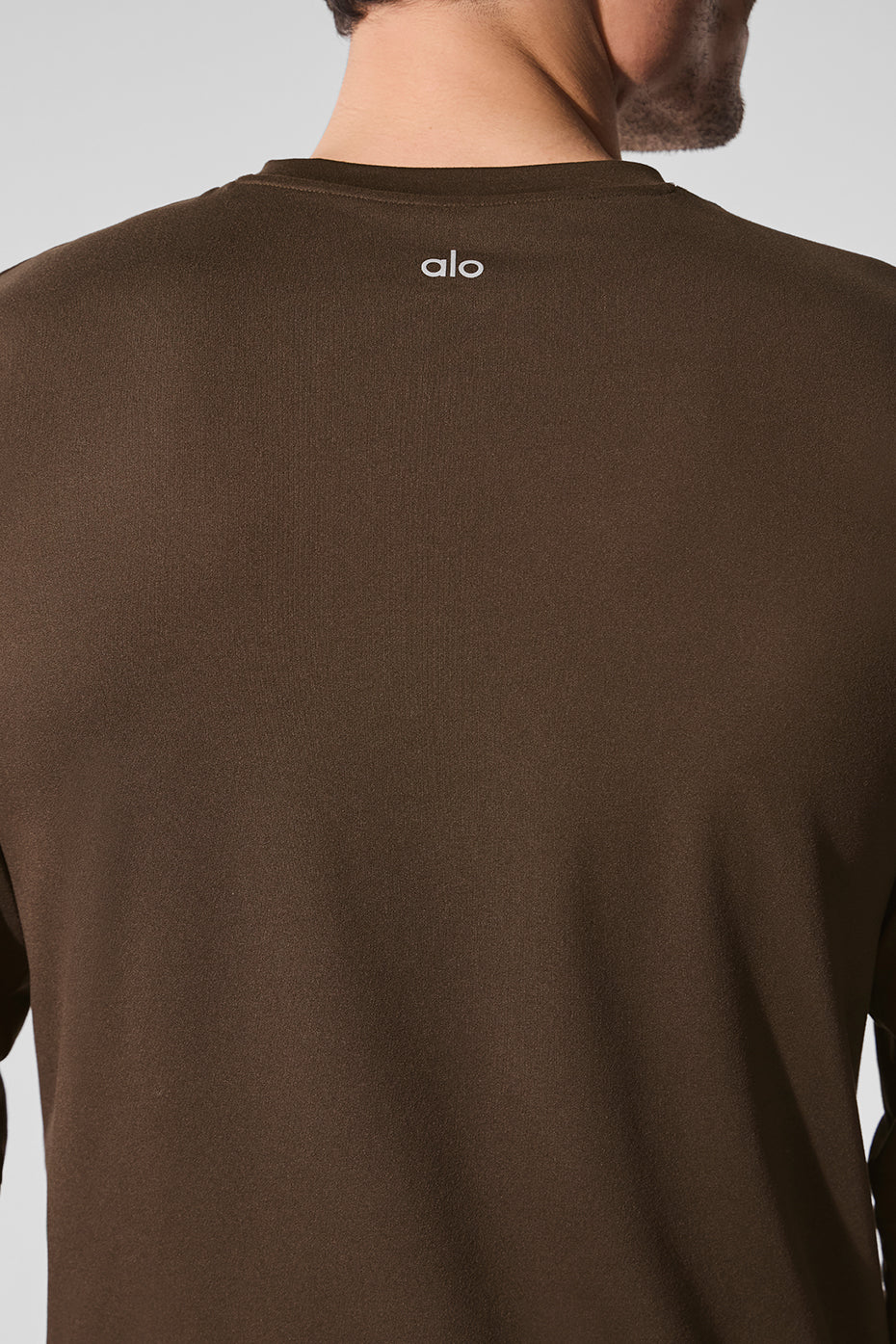 Close-up of the fabric texture on the crewneck sweatshirt.