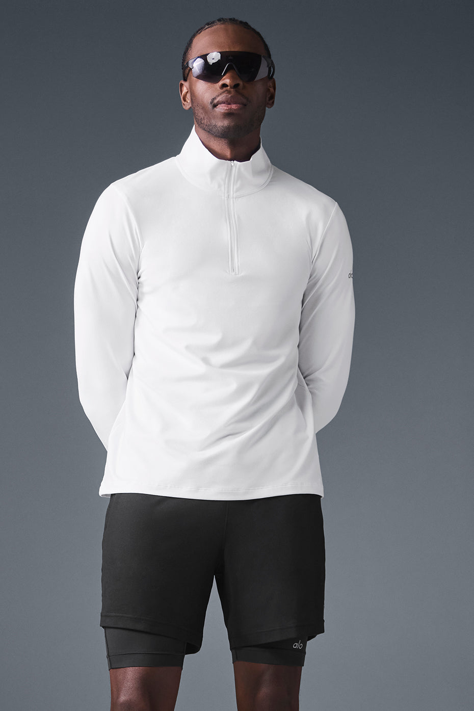 Elevate 1/4 zip long sleeve shirt in white, ideal for gym sessions.