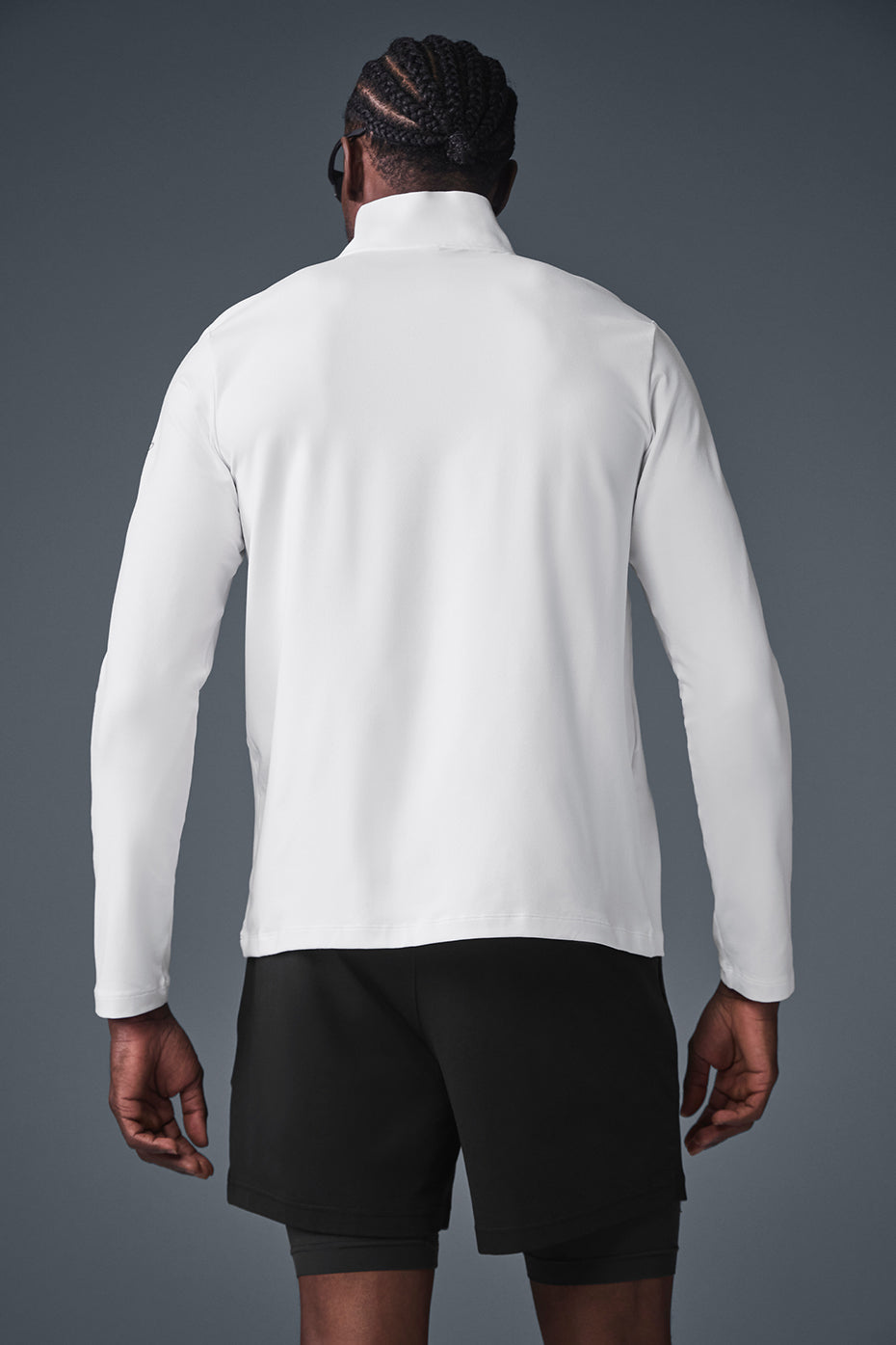 Person wearing the quarter zip shirt during outdoor activities.