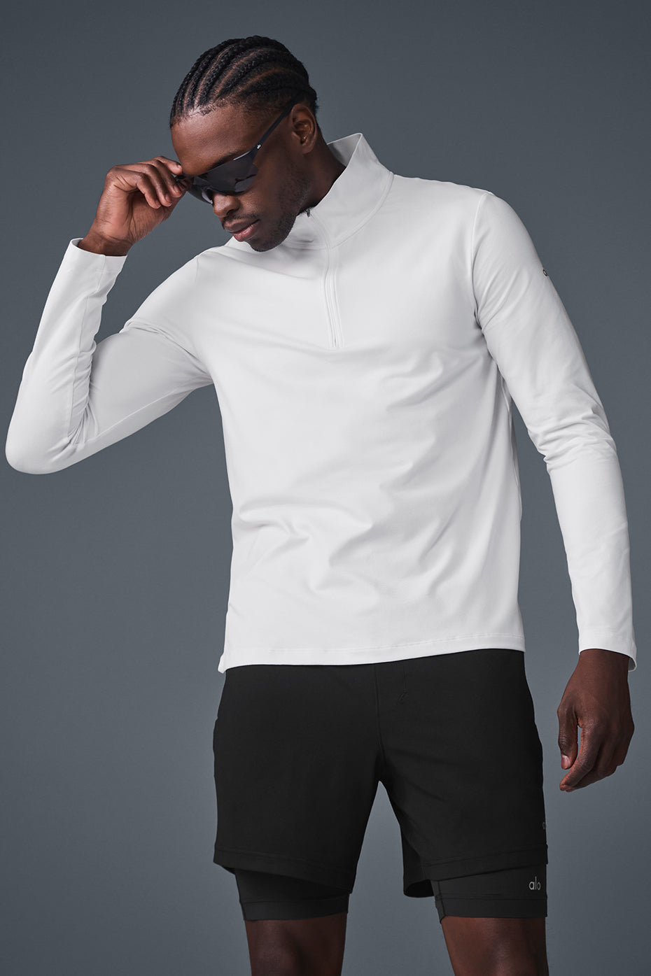 Elevate 1/4 zip long sleeve shirt in white, ideal for gym sessions.