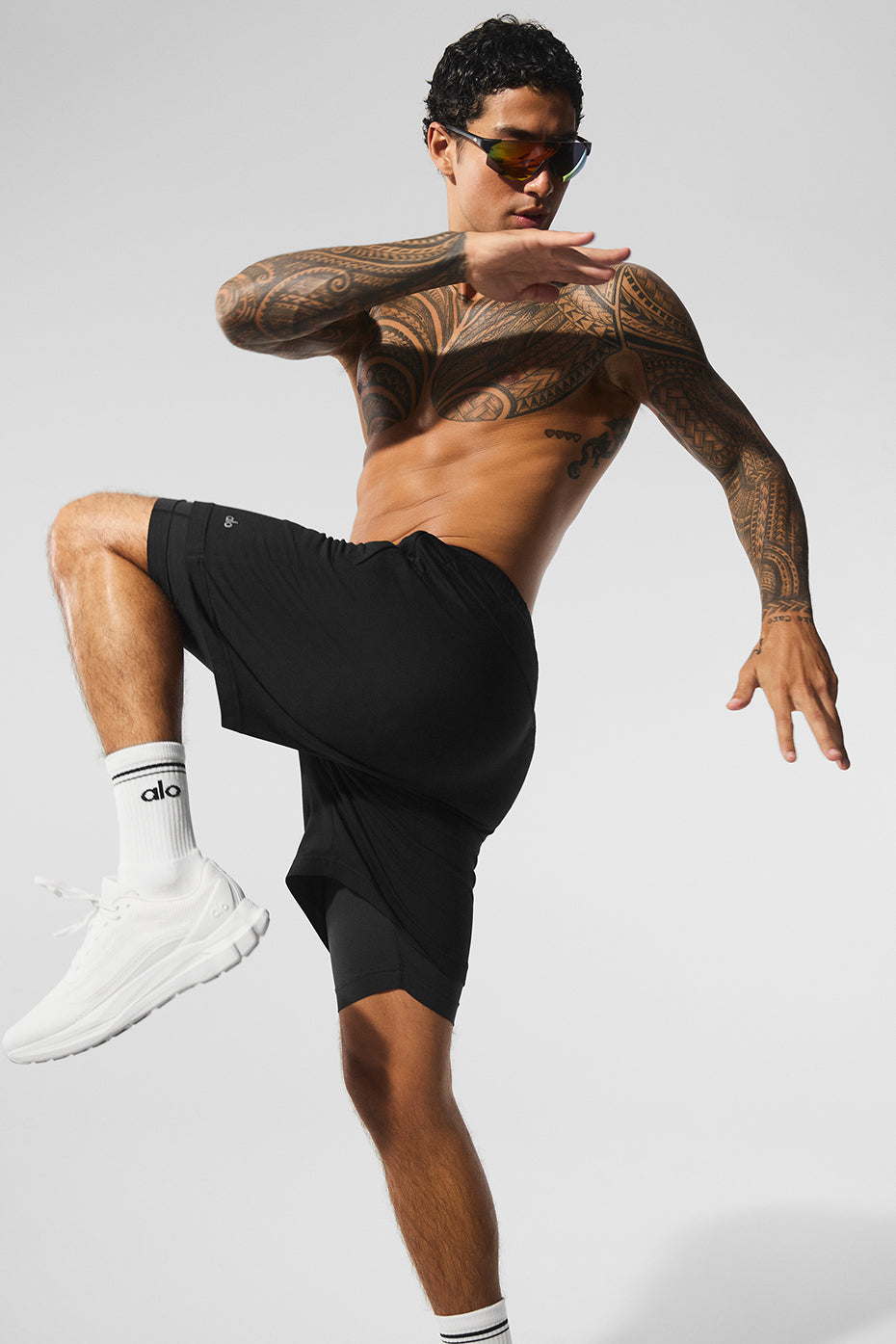 Front view of Conquer React 2-in-1 Performance Shorts in black, showcasing the design.