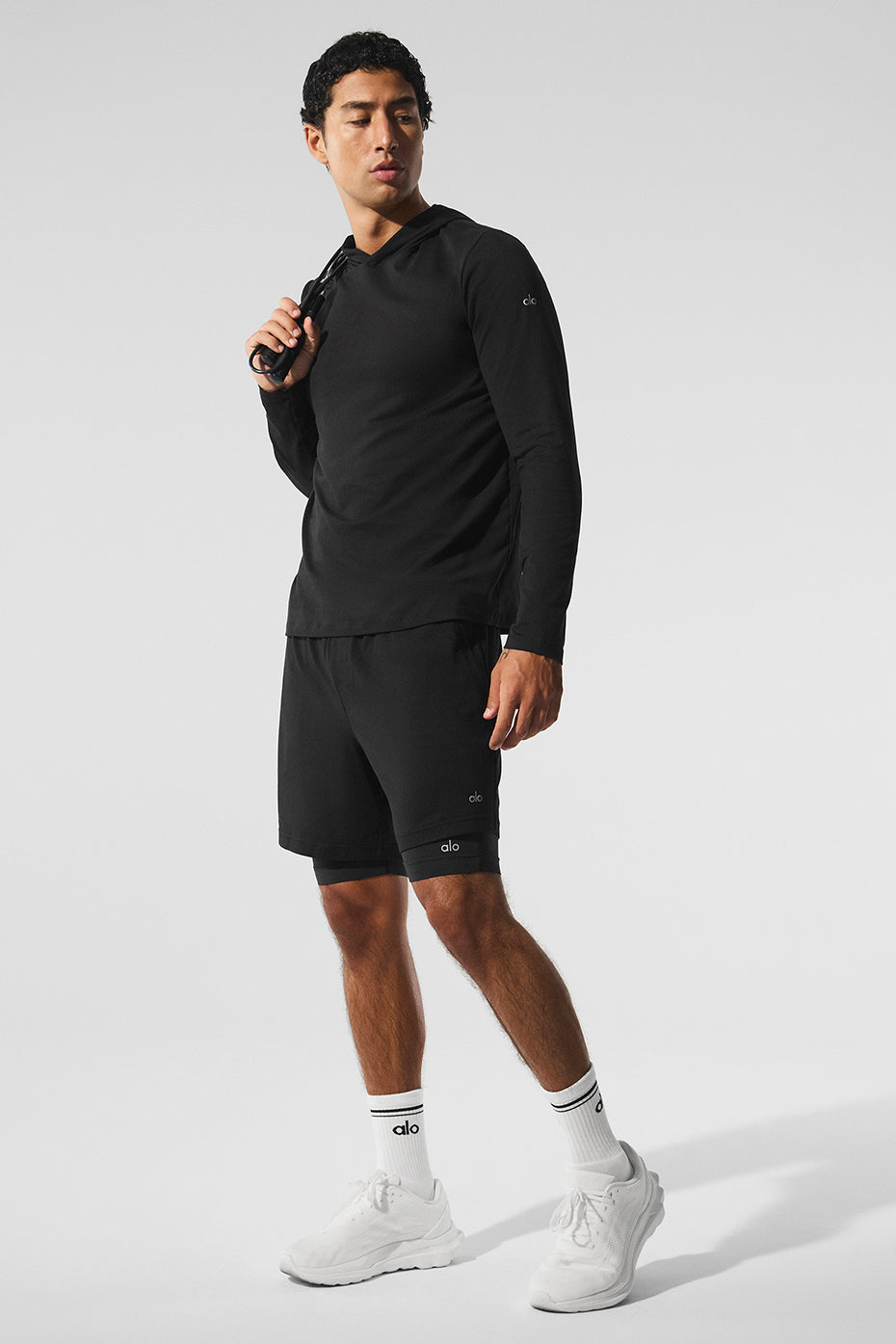 Front view of Conquer React 2-in-1 Performance Shorts in black, showcasing the design.