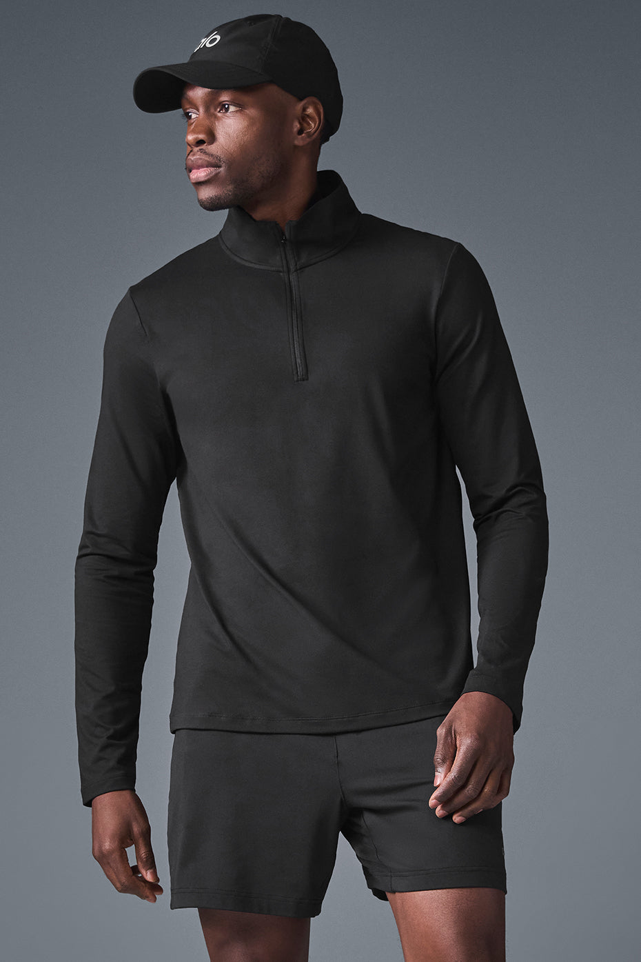 Front view of Elevate 1/4 Zip Long Sleeve shirt in black, showcasing its sleek design.