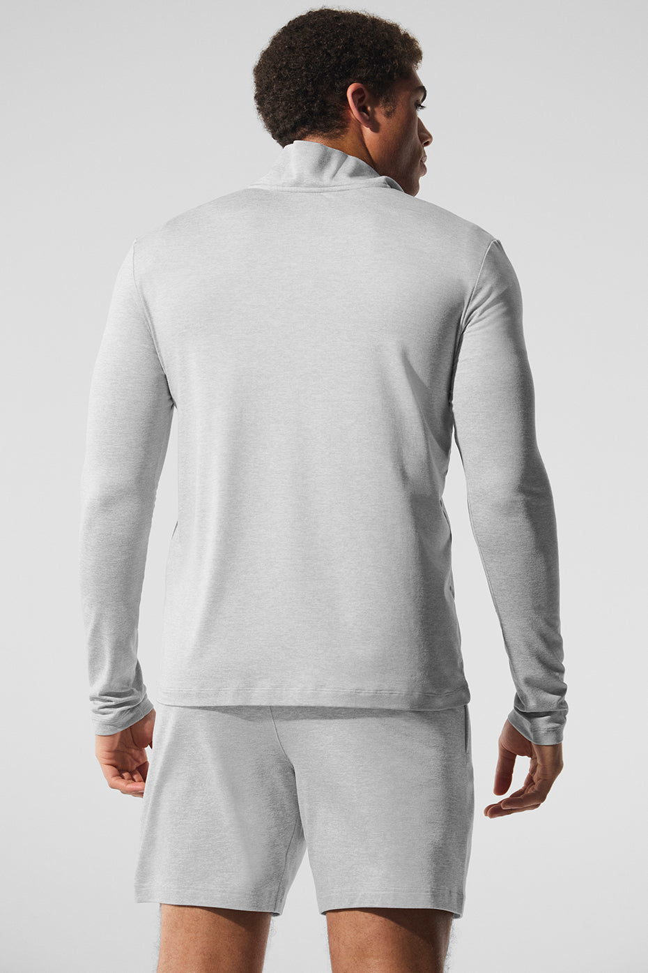 Model showcasing athletic fit button down shirts for versatile wear.