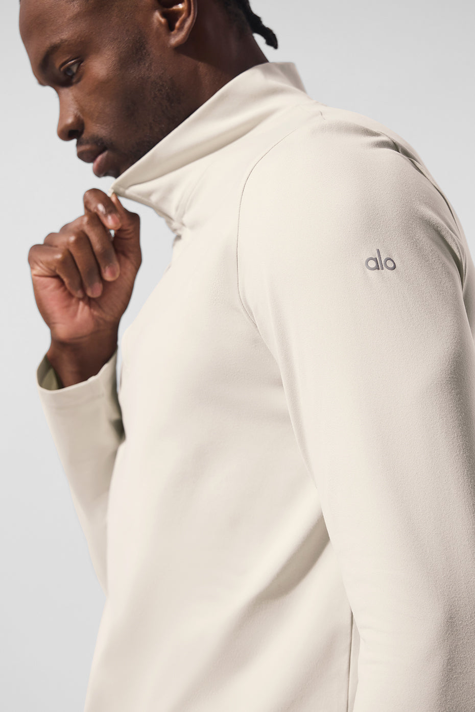Front view of Elevate Performance 1/4 Zip Long Sleeve Shirt in Bone, showcasing its sleek design.