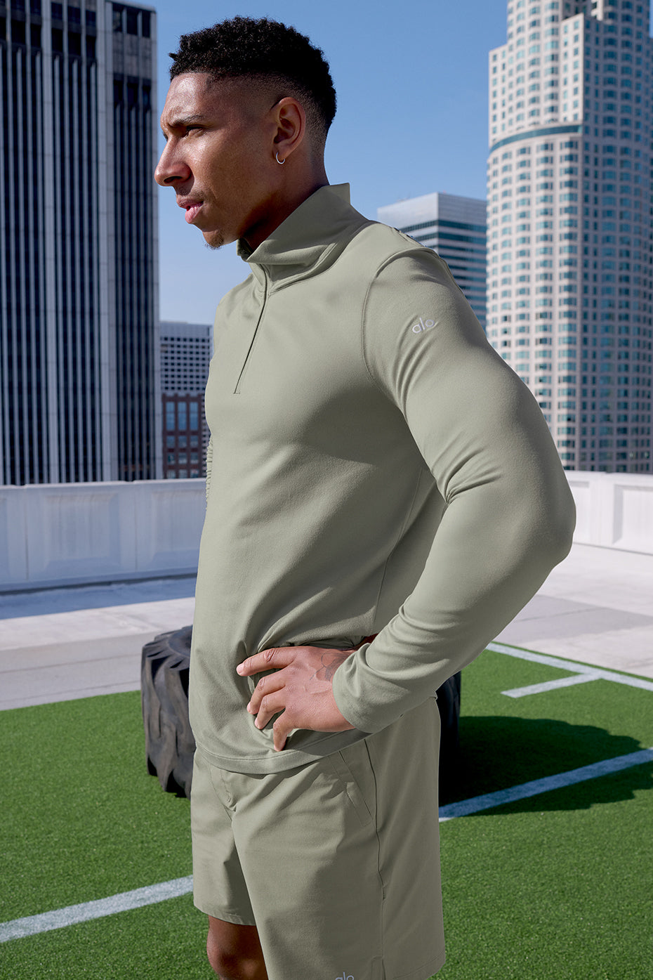Back view highlighting the moisture-wicking design of the Limestone long sleeve workout shirt.