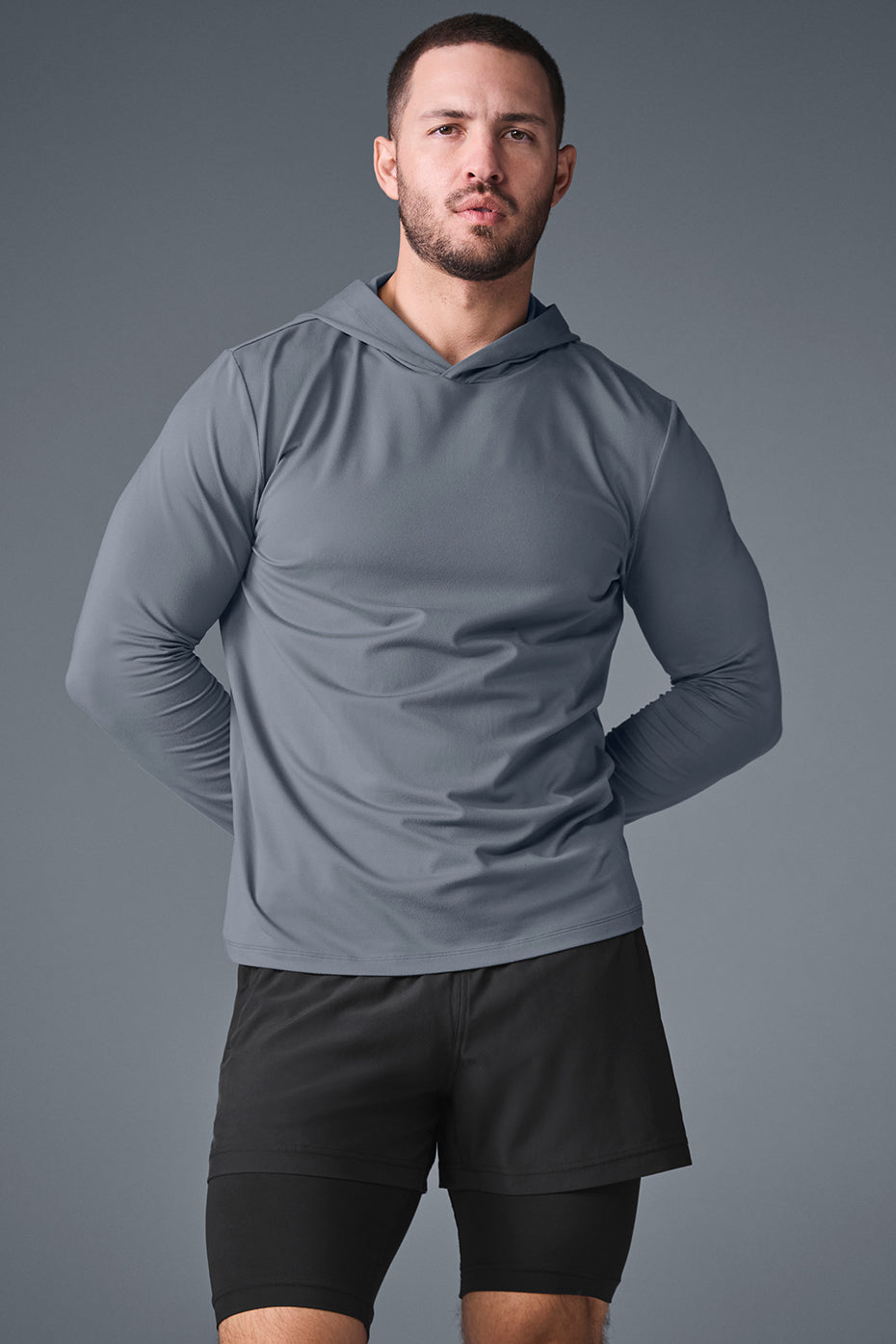 Close-up of the moisture-wicking long sleeve shirt fabric showing stretch and breathability
