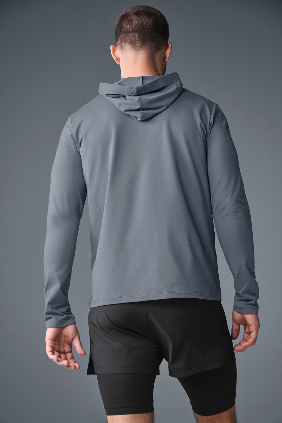Full view of the lightweight hoodie with hood up, perfect for outdoor workouts