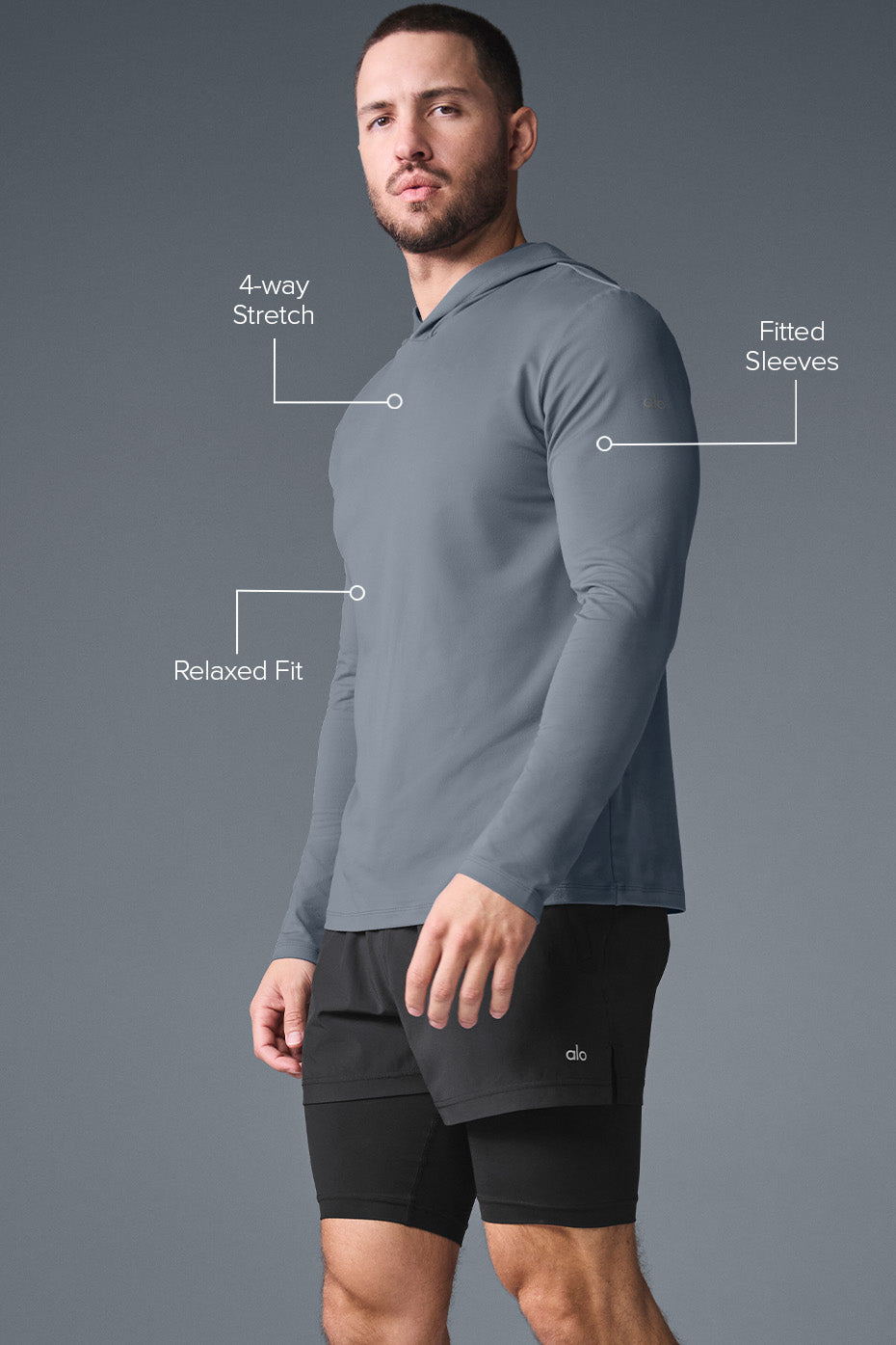 Model wearing the training hoodie during a morning run in the park