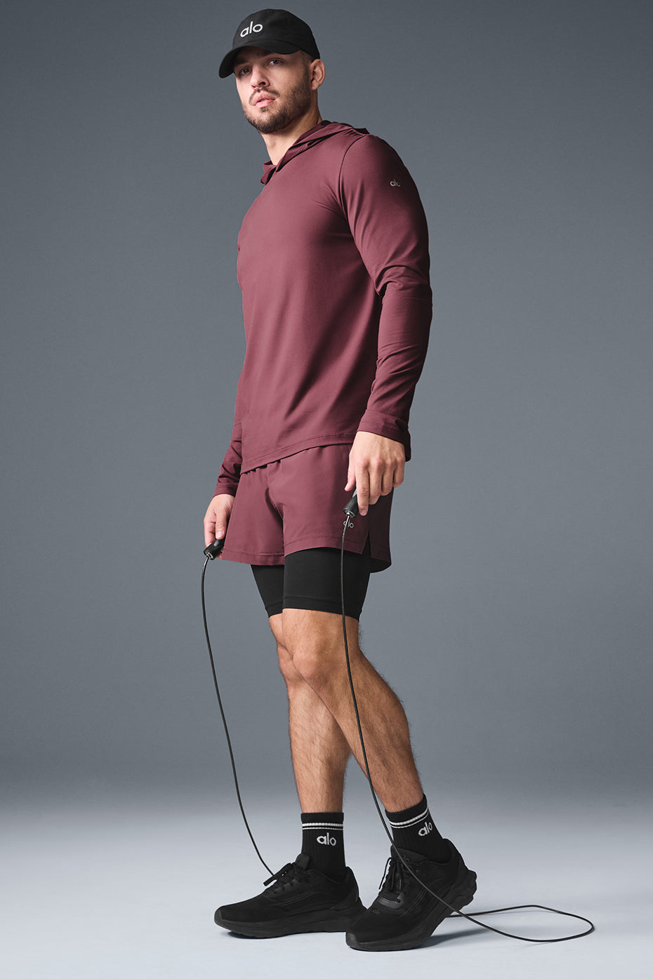 Close-up of the Conquer Reform long sleeve hoodie showing its lightweight fabric