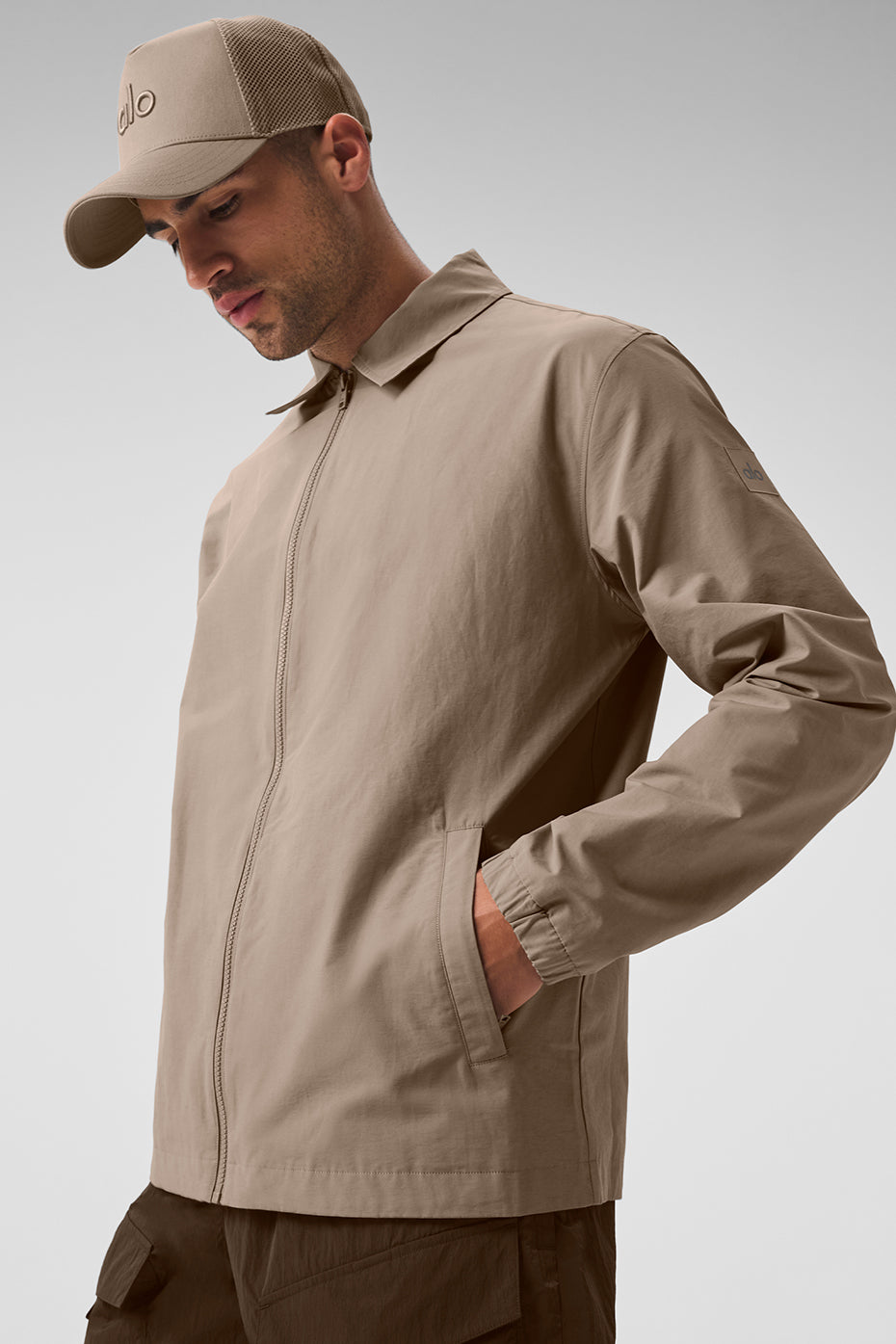 Close-up of the Torrent Overshirt’s corduroy texture and zippered pockets