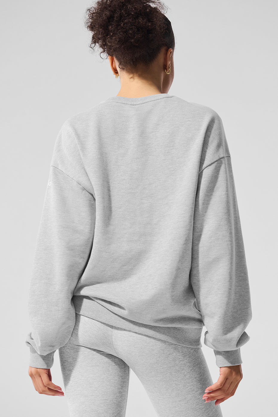 Side view of the breathable sweatshirt, highlighting the cuffed sleeves.