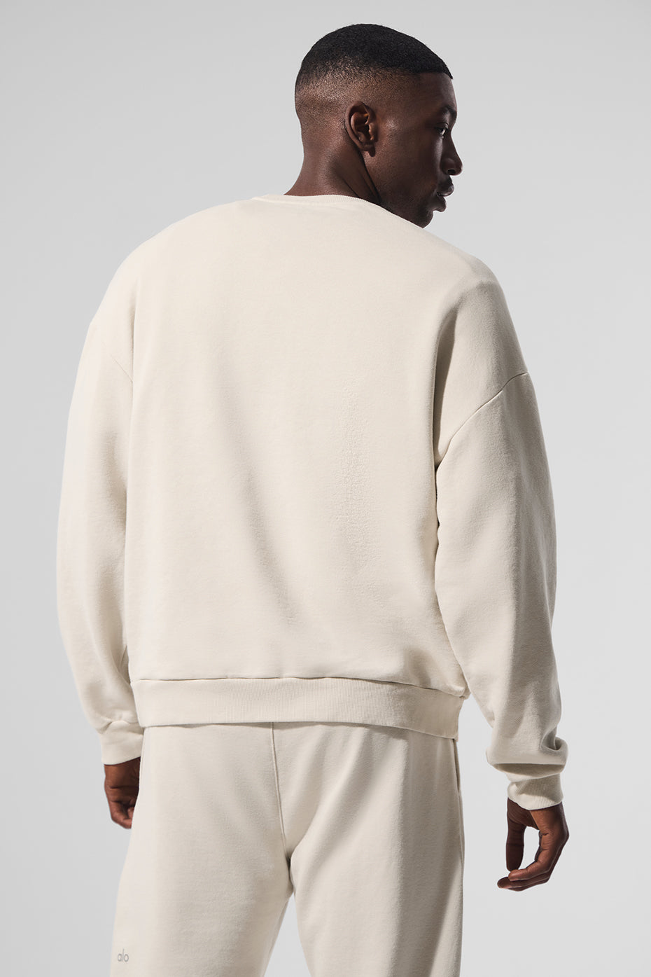 Casual street style featuring a French terry sweatshirt in a relaxed fit