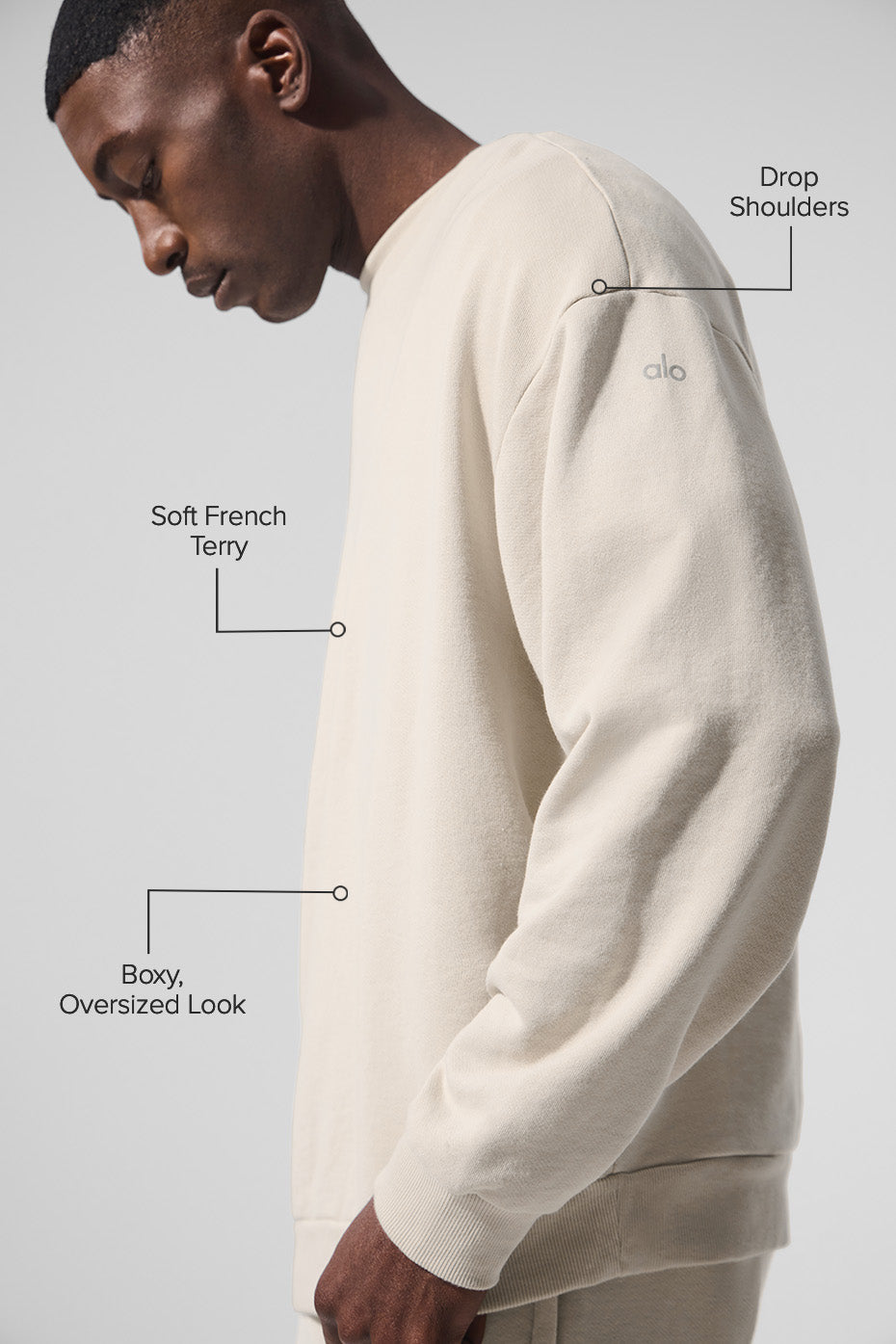 Person doing warm-up exercises wearing a breathable workout pullover