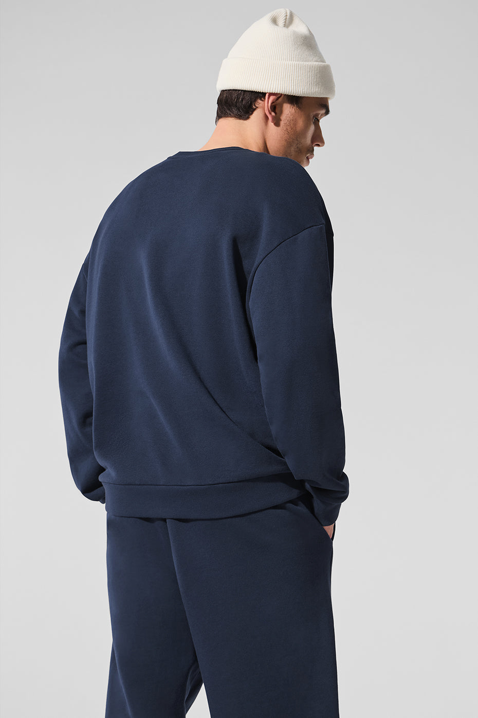 Side angle of Navy Chill Crew Neck Pullover, perfect for active women.