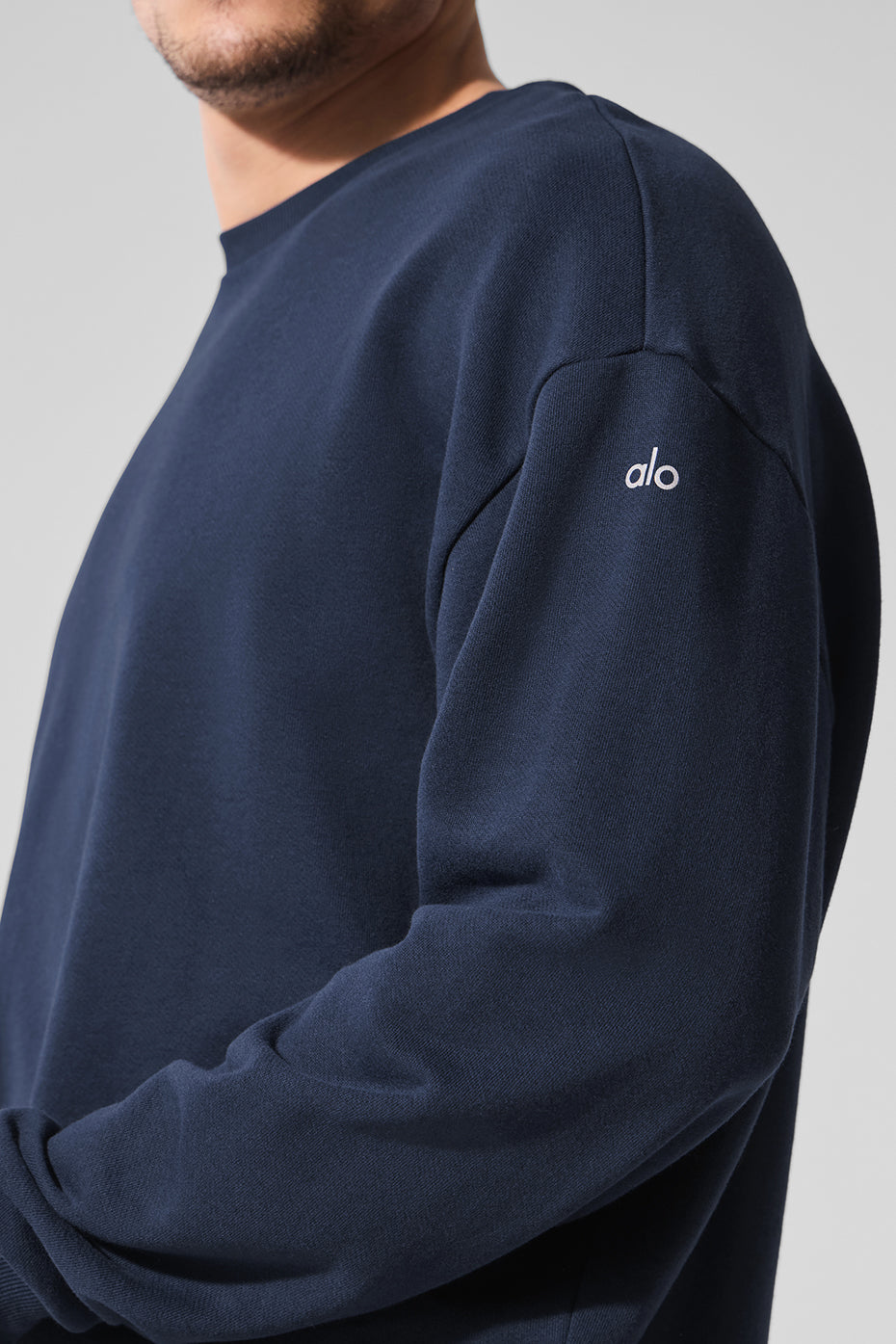 Back view of Navy Chill Crew Neck Pullover, highlighting its comfortable fit.
