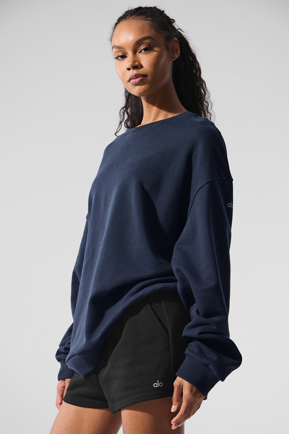 Side view of the sweatshirt highlighting drop shoulder design.