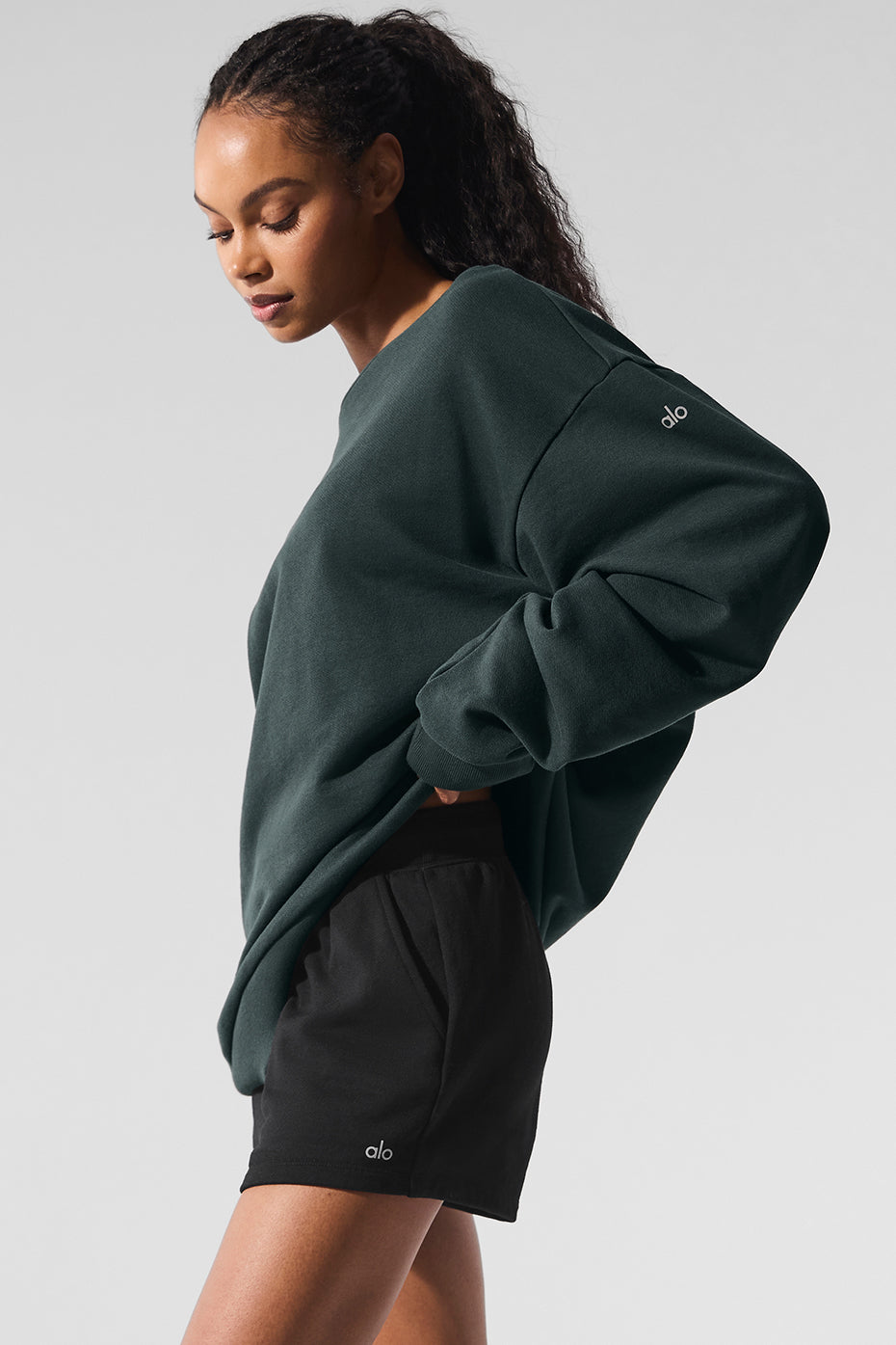 Close-up of the soft French terry fabric and cuffed sleeve detail