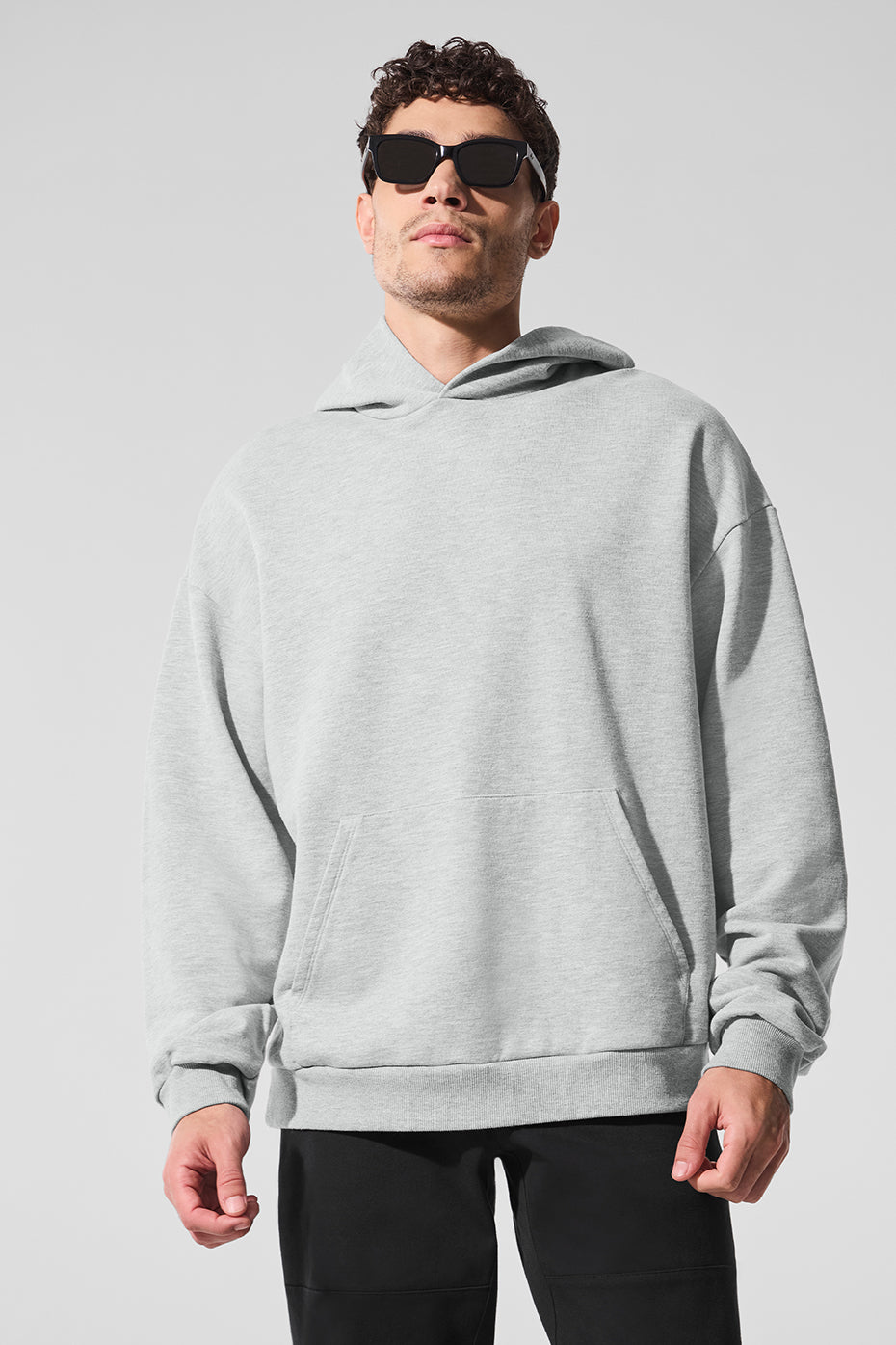 Front view of the Essential Comfort Hoodie in Athletic Heather Grey.